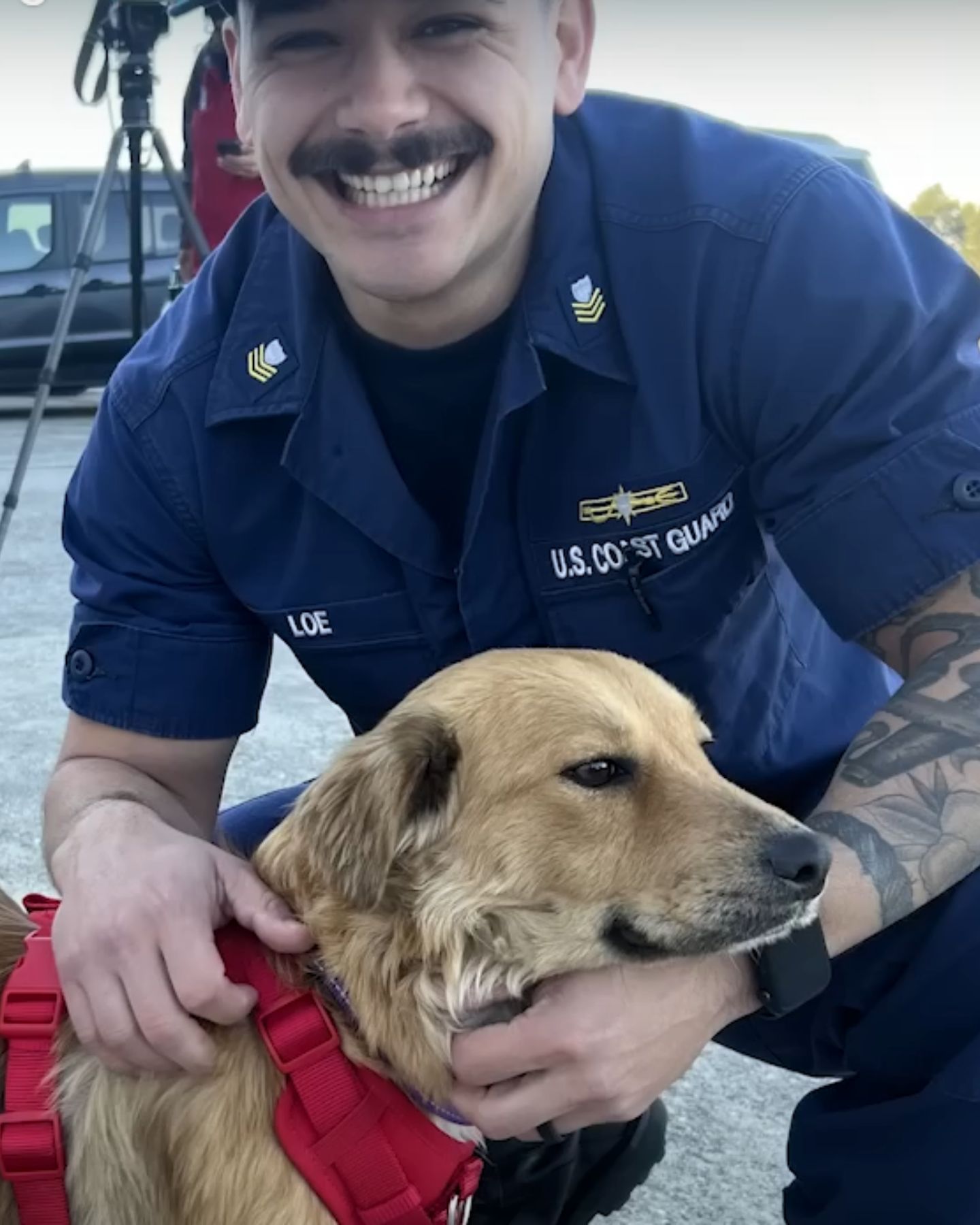 man with rescued dog
