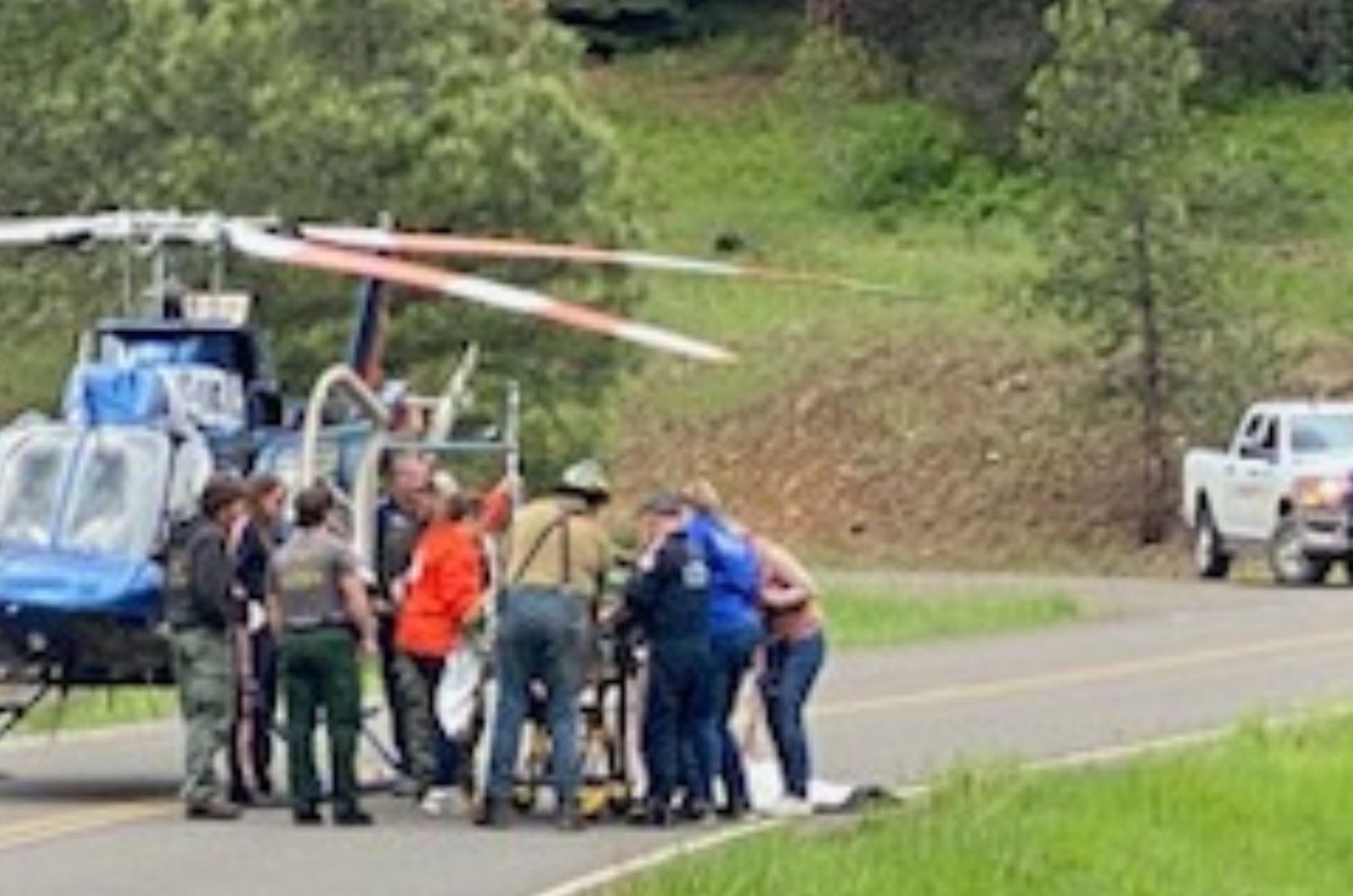 rescue team next to a helicopter