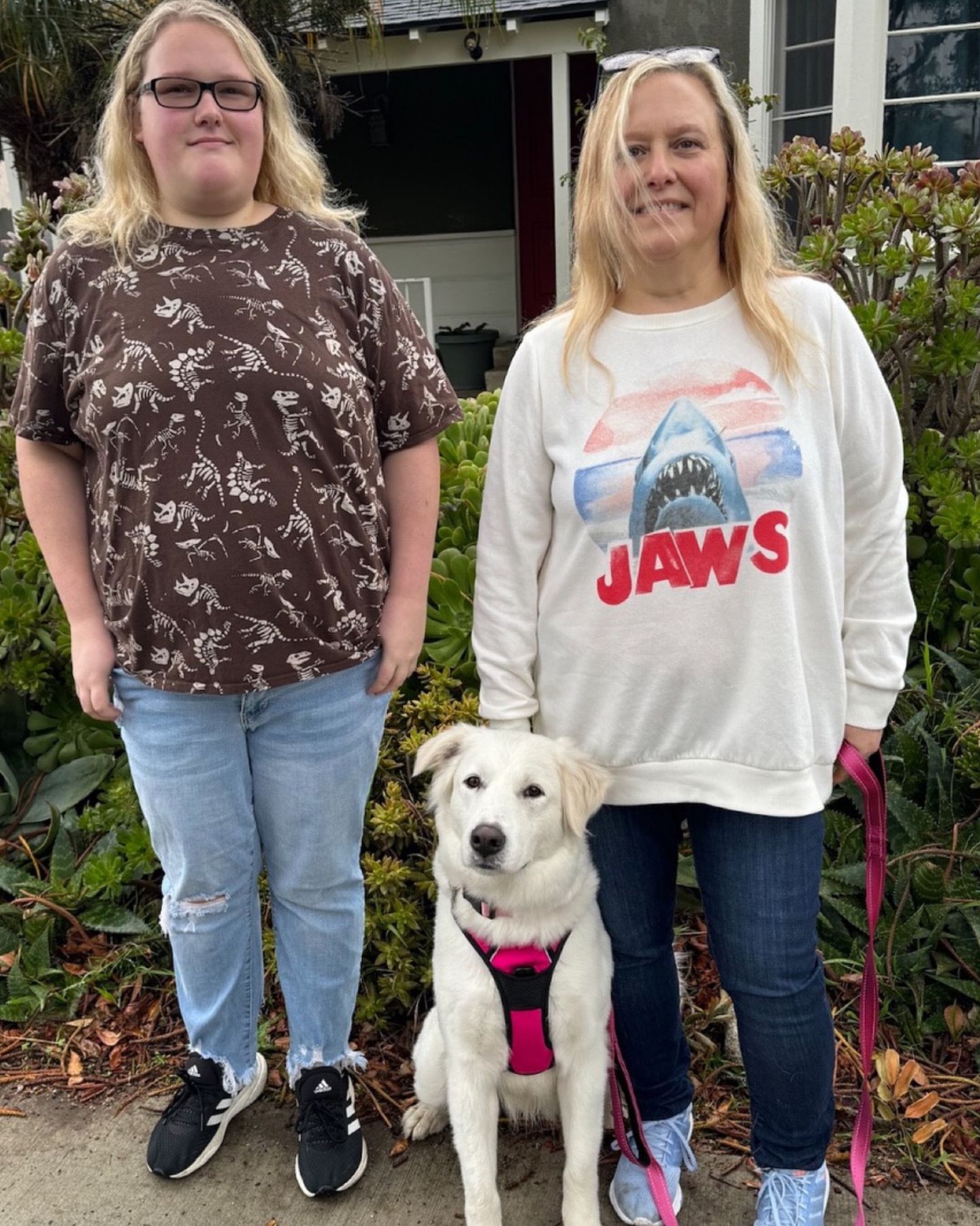 two woman and a dog