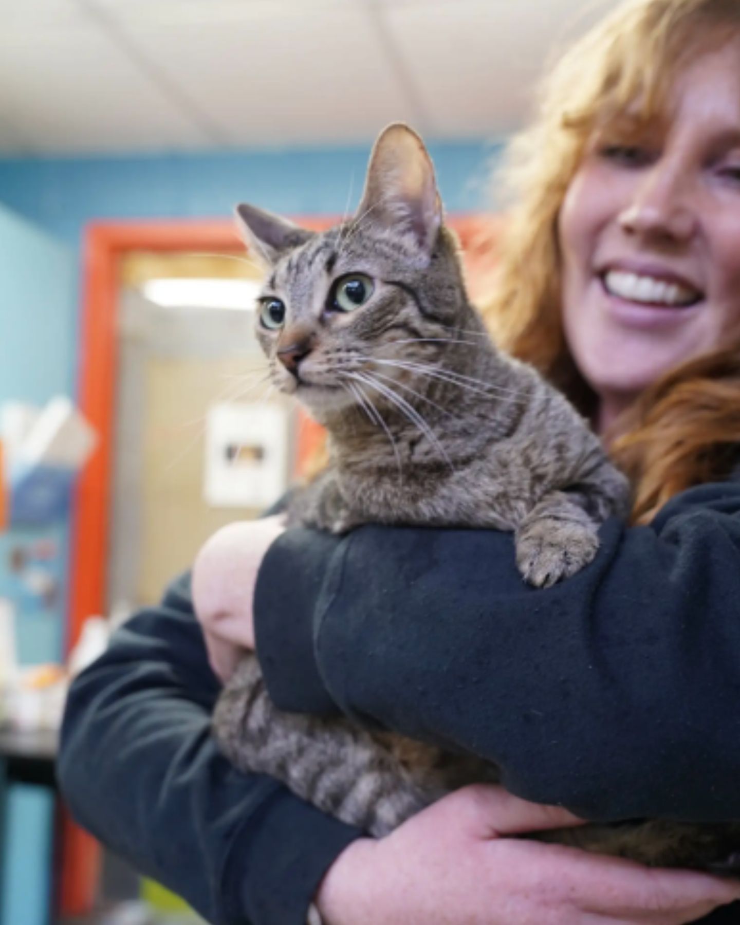 woman with adopted cat