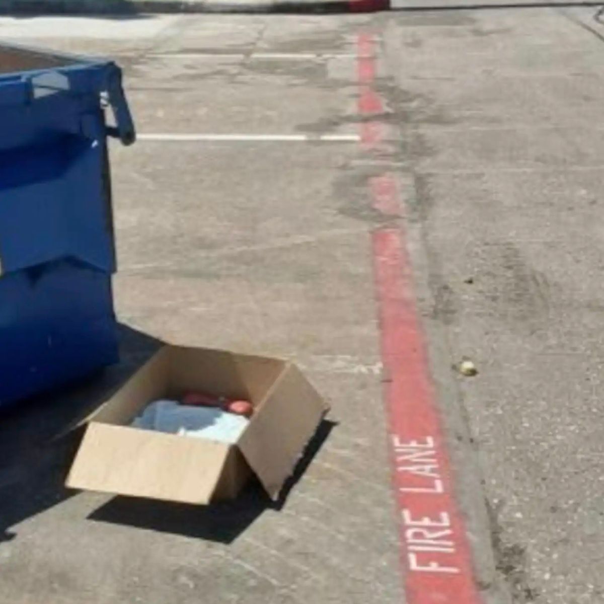 box next to dumpster