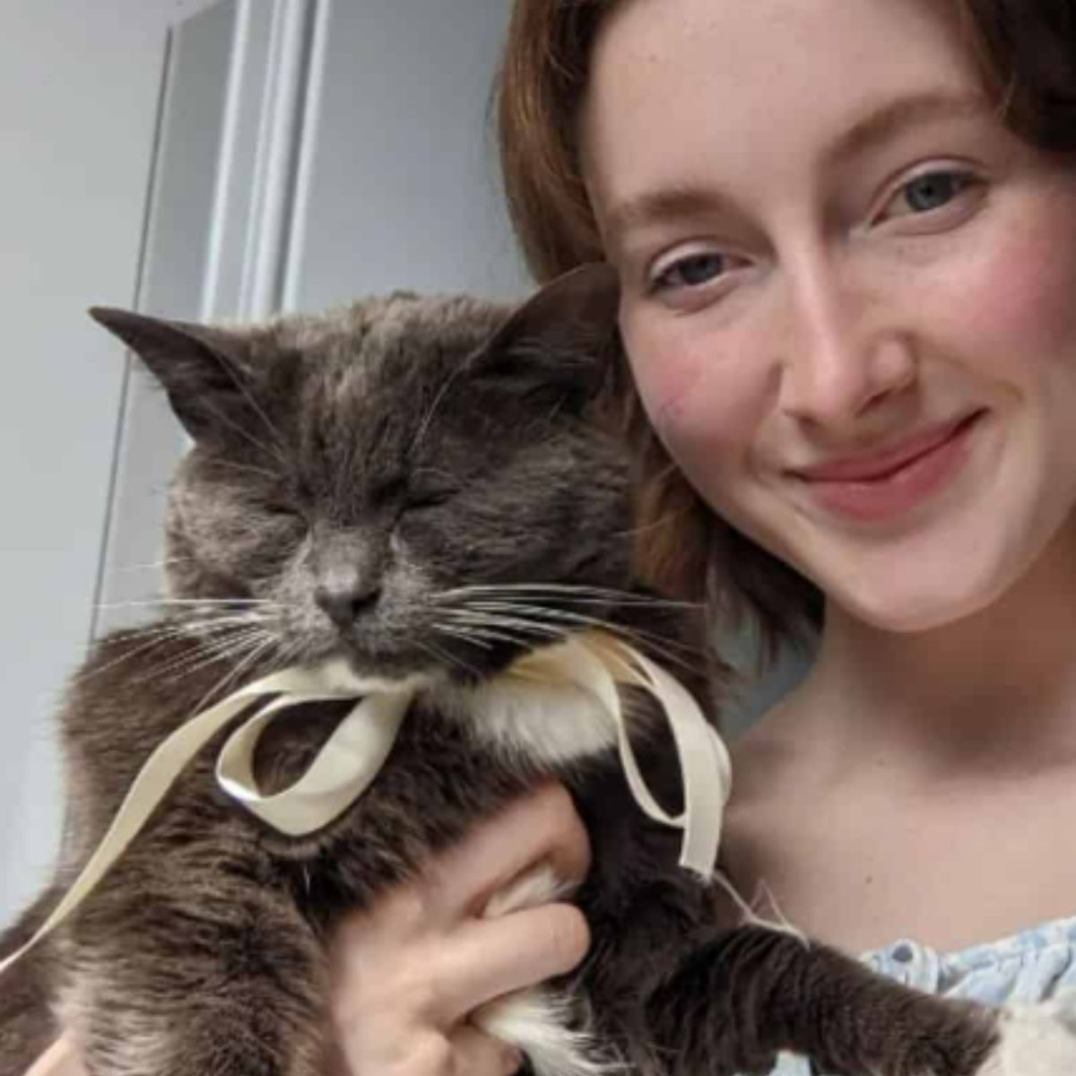 cat with her owner