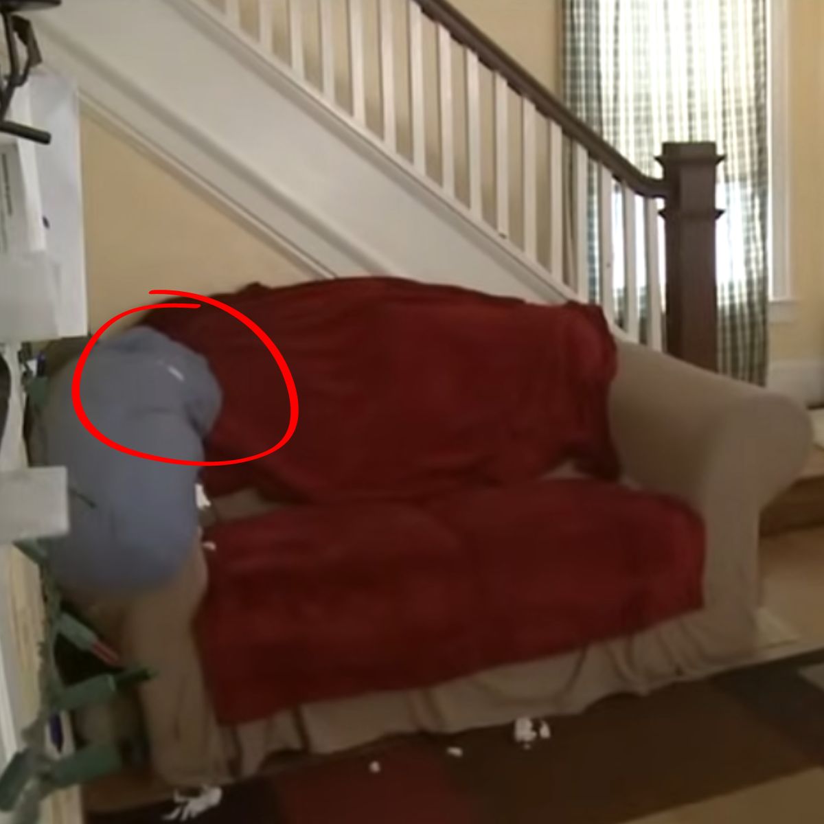 couch with red cover