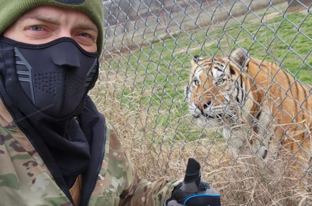 man and a tiger