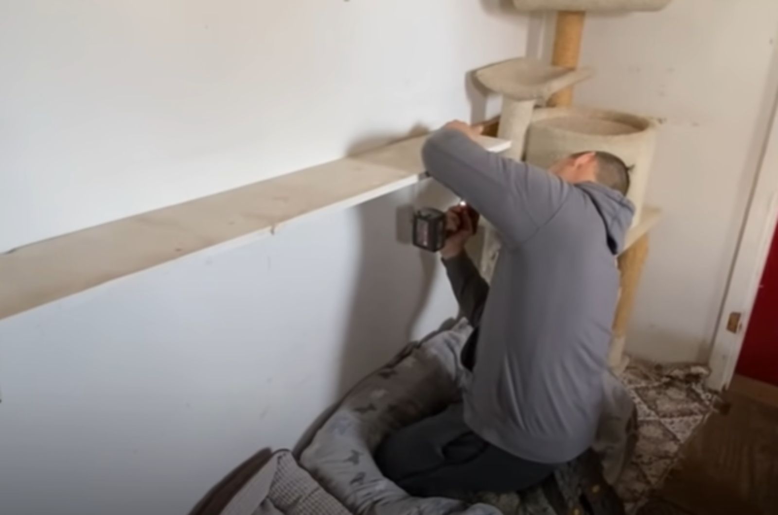 man building a shelf