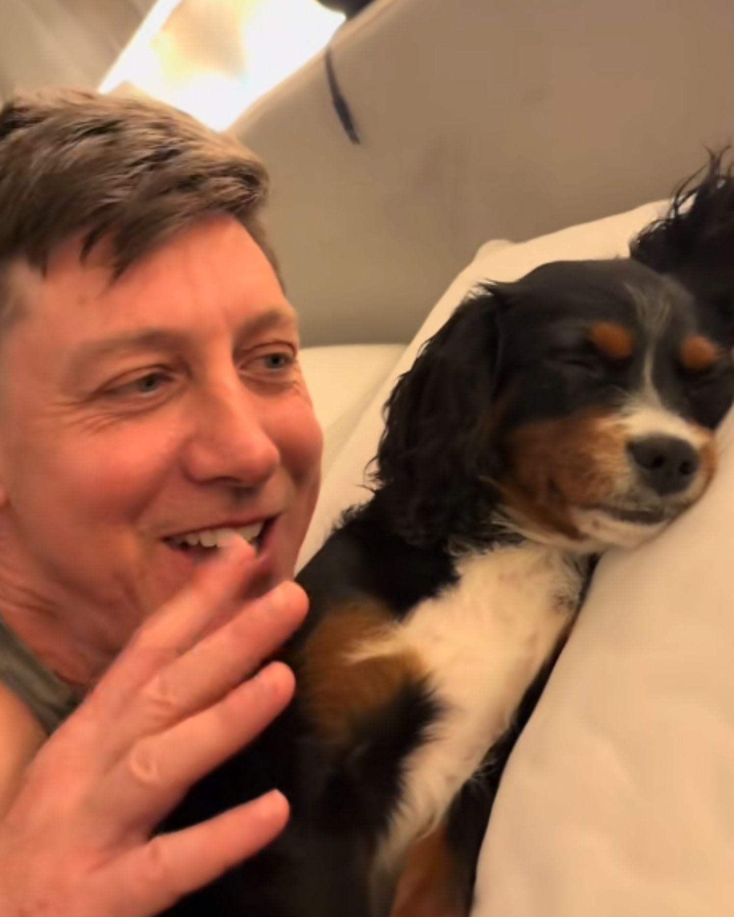 man waking up the dog