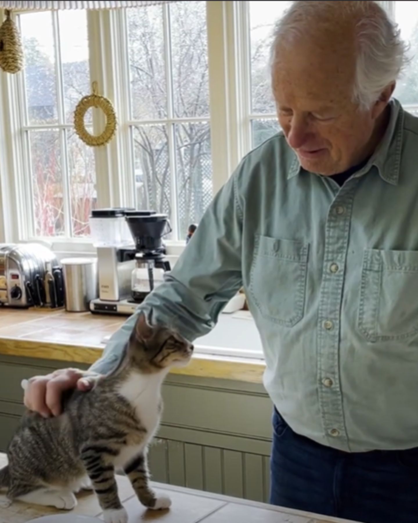 man with a cat