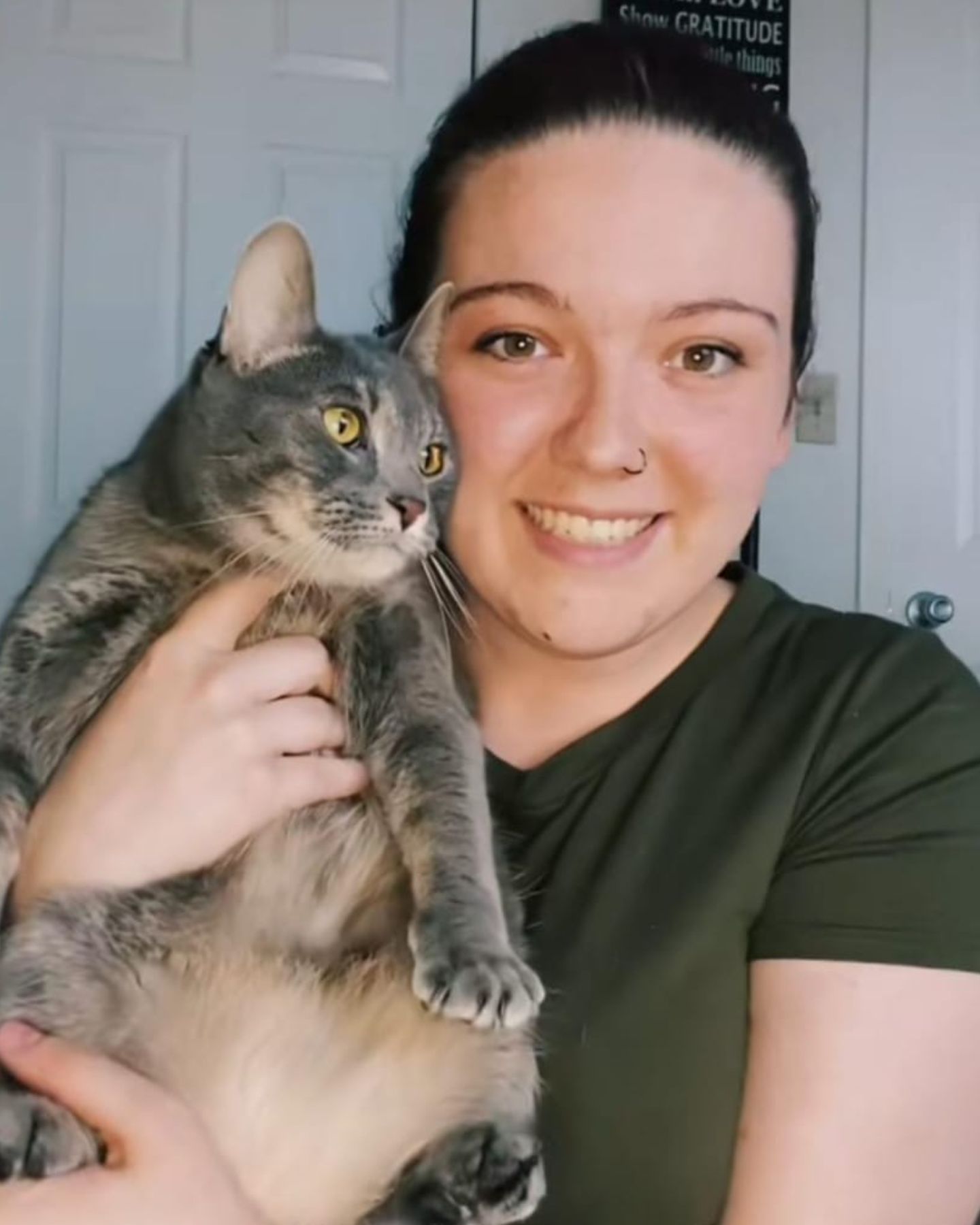 photo of woman and a cat
