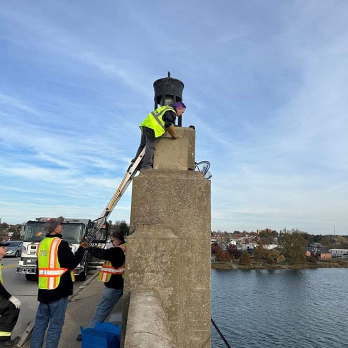 rescuer climbing on the bridge