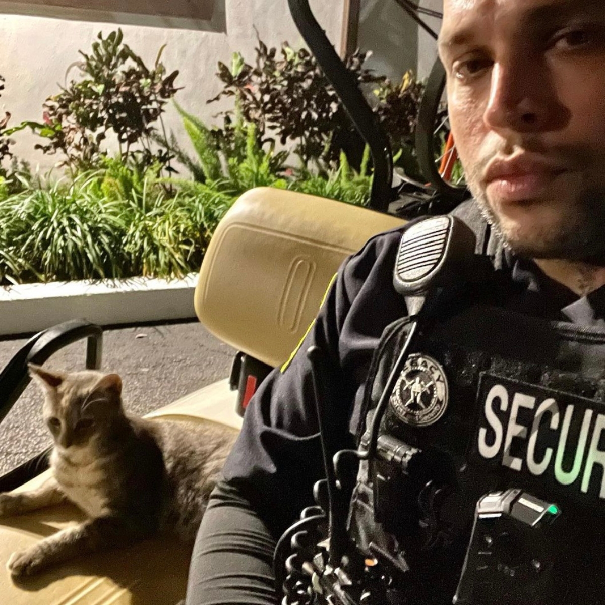 security guard with a cat