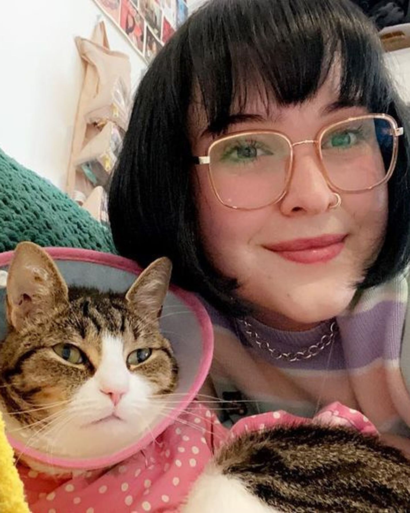 woman and cat with collar
