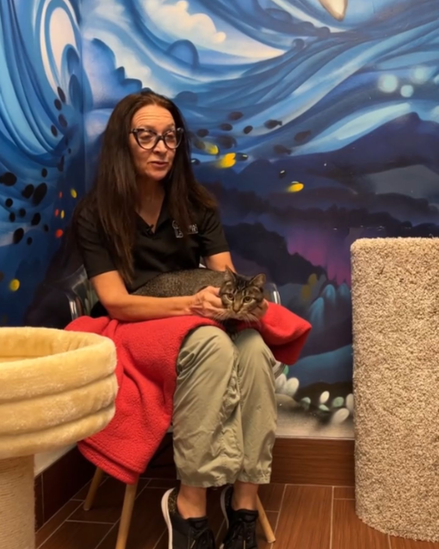 woman holding a cat