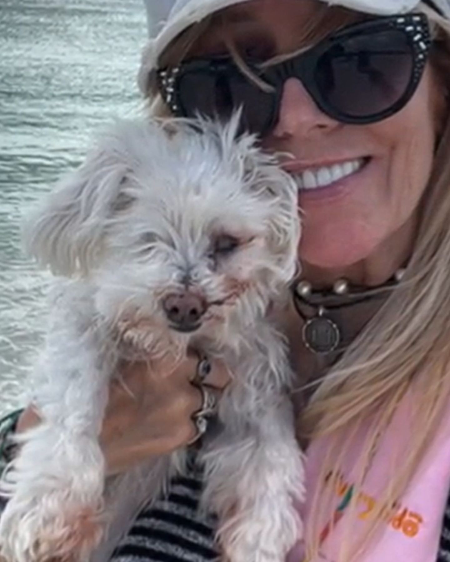 woman with a blind and deaf dog