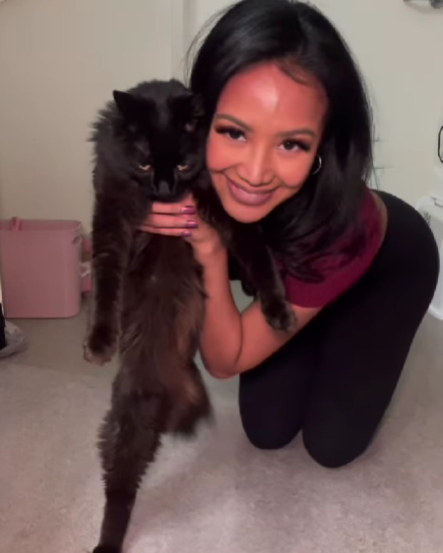 black big cat and woman
