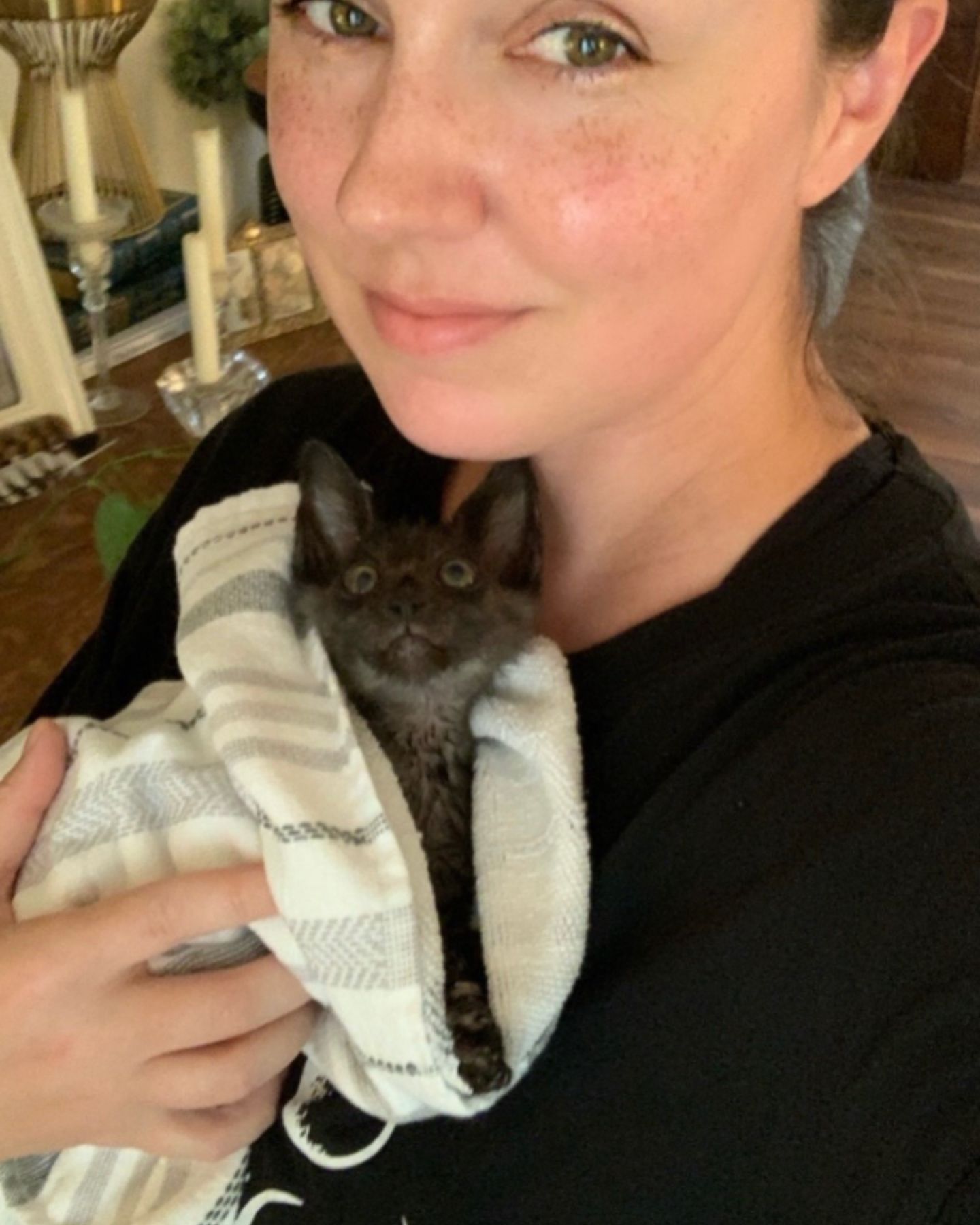 found kitten in woman's arms
