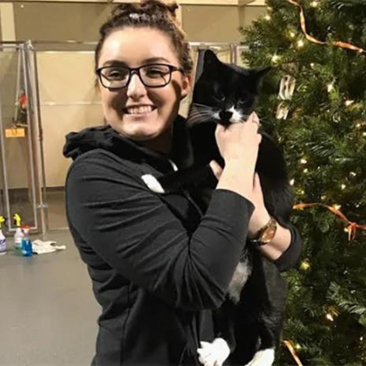 happy woman with a dark cat