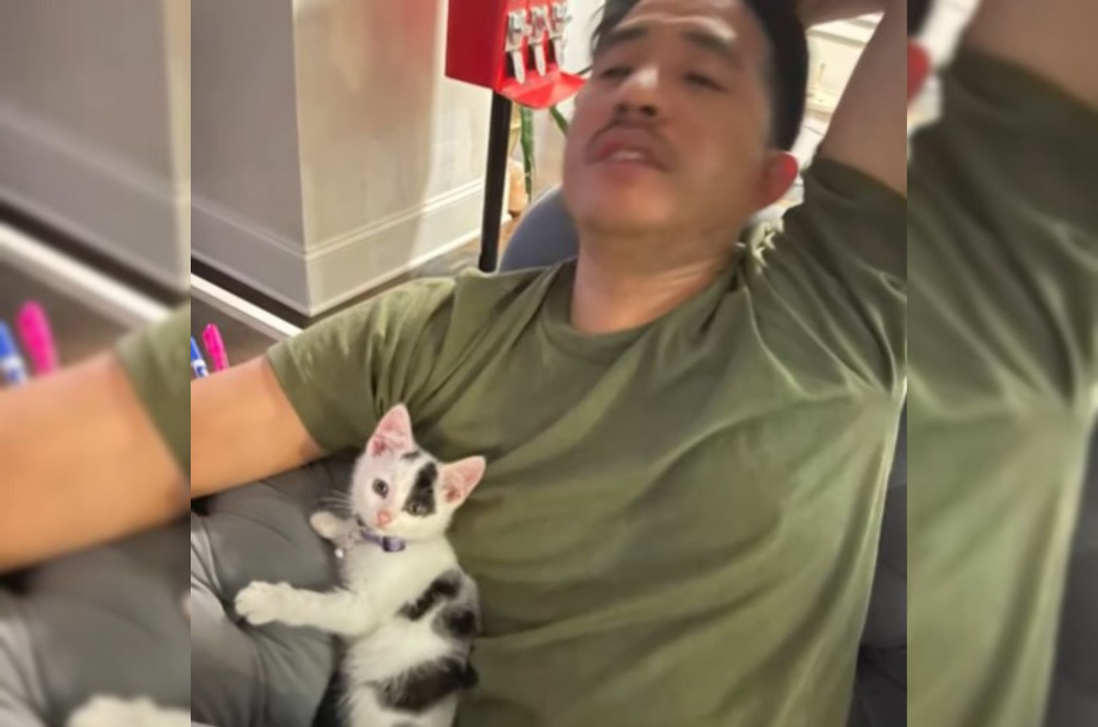 man and kitten