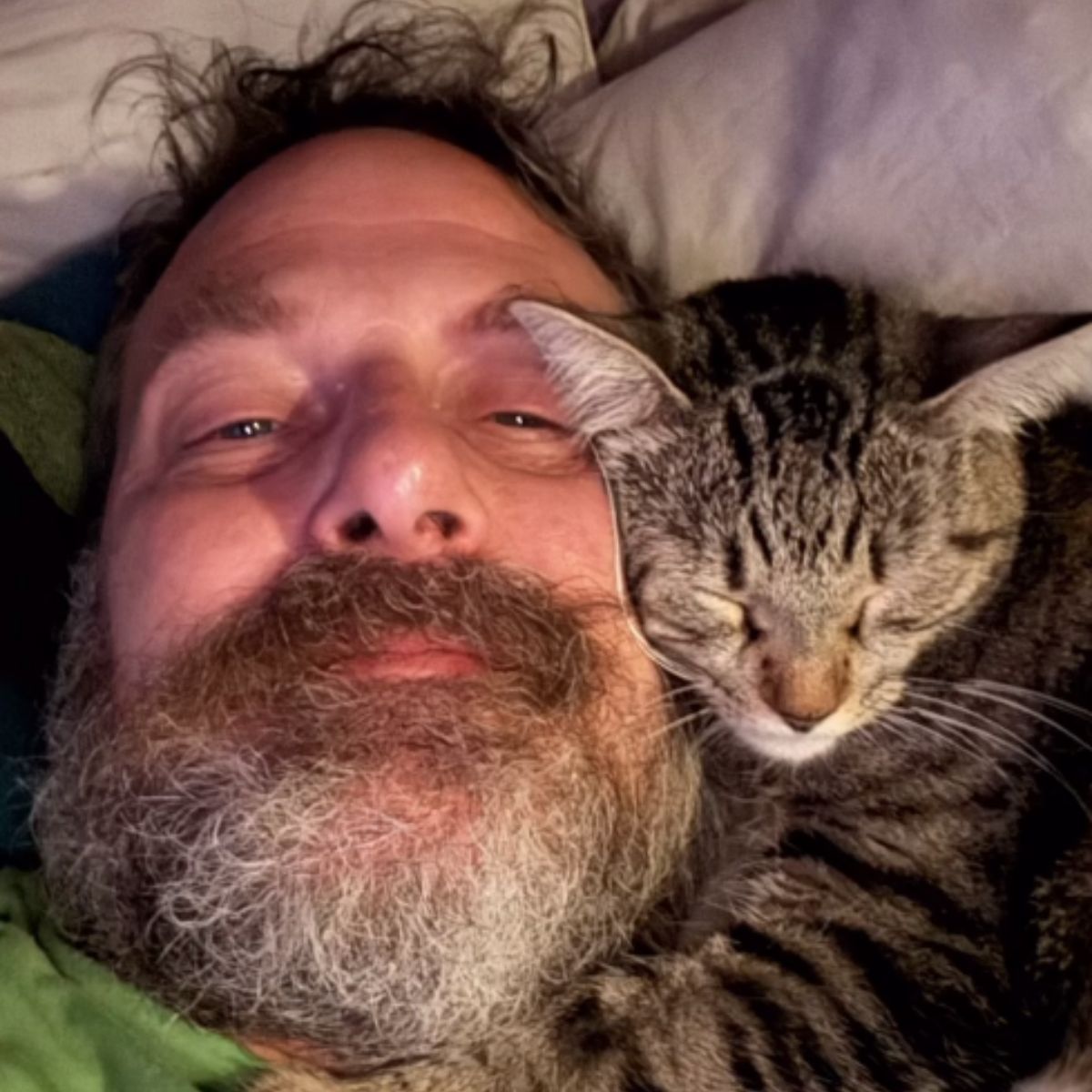 man with cat