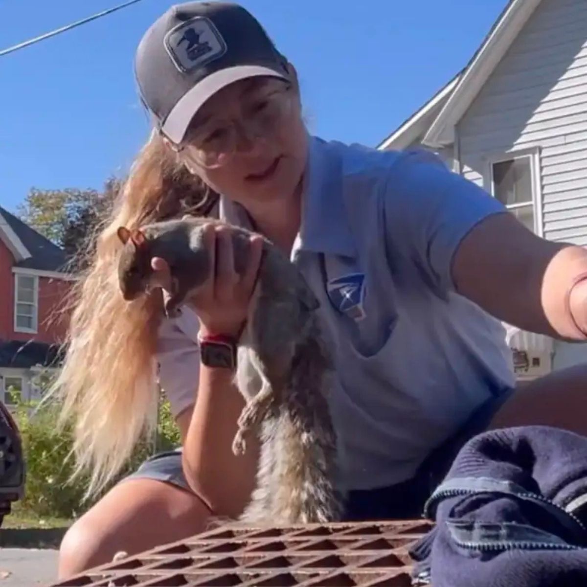 woman and tiny squirrel