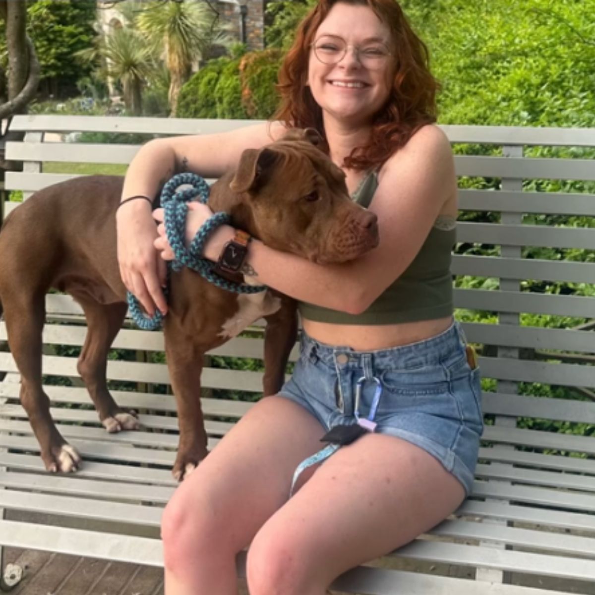 woman hugs shelter dog