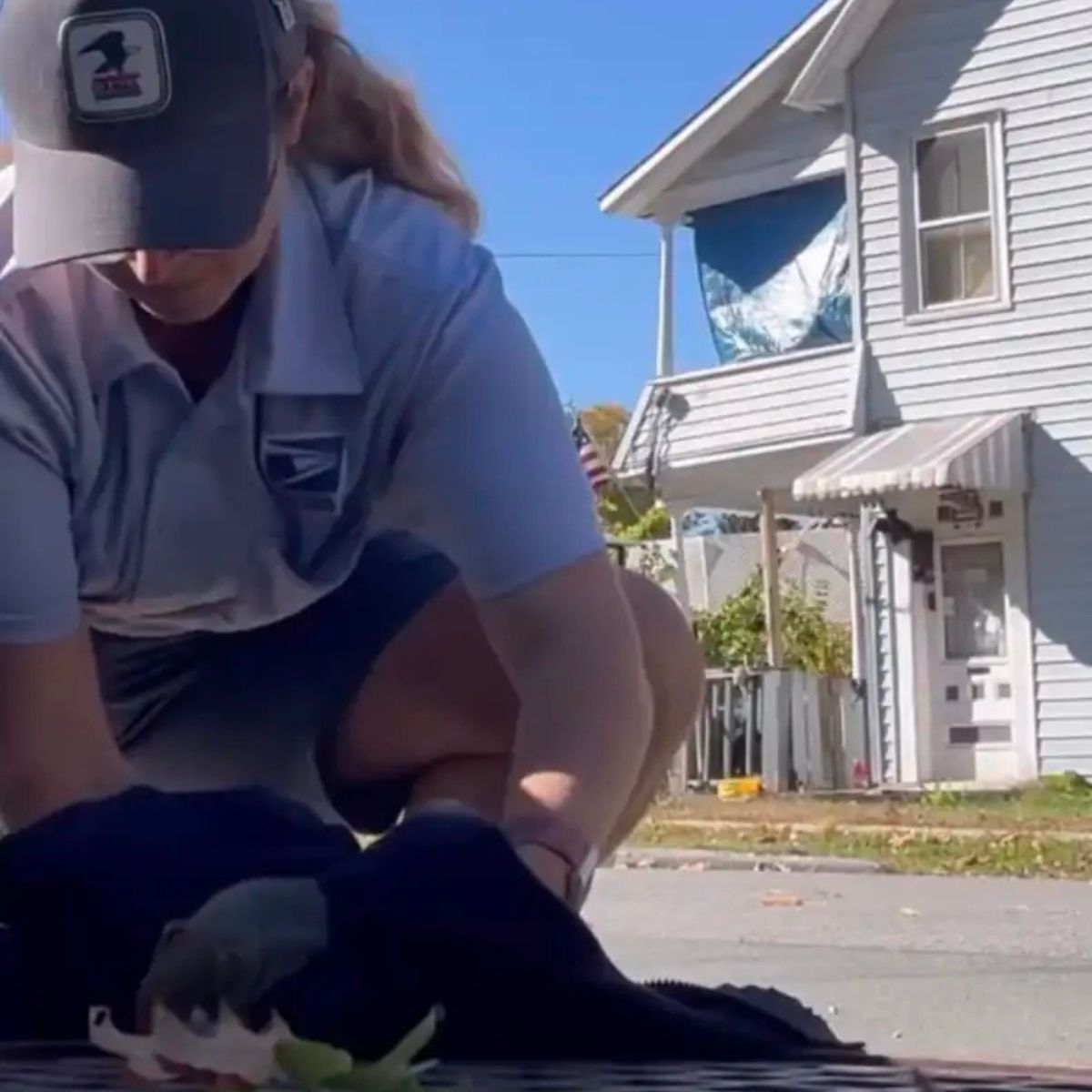 woman saves tiny squirrel