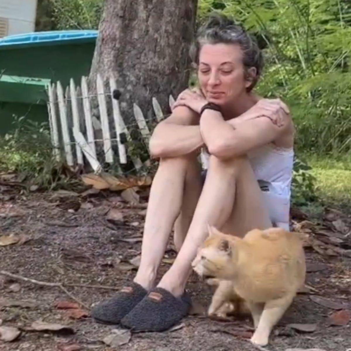 woman with cat outside