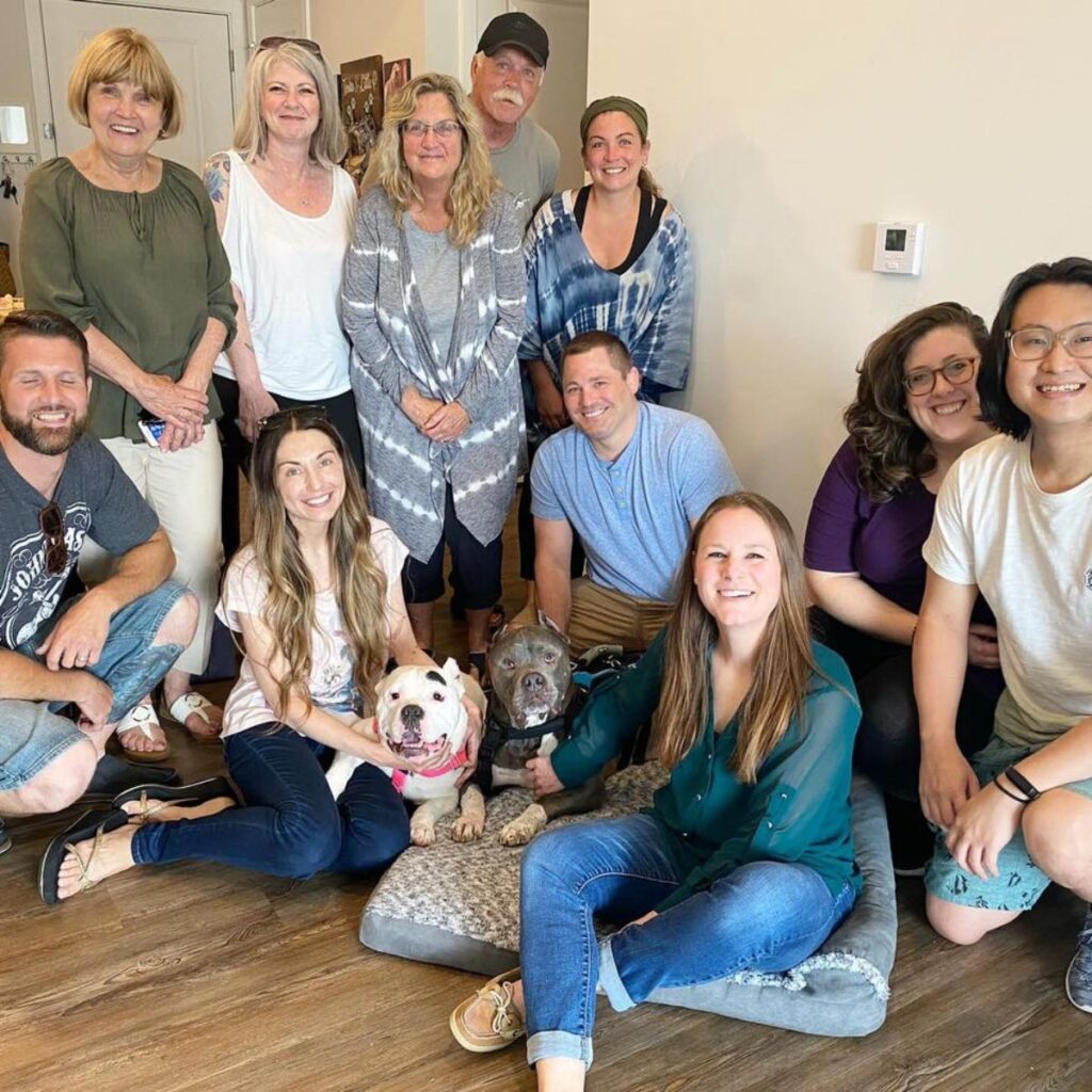 happy family with pit bulls