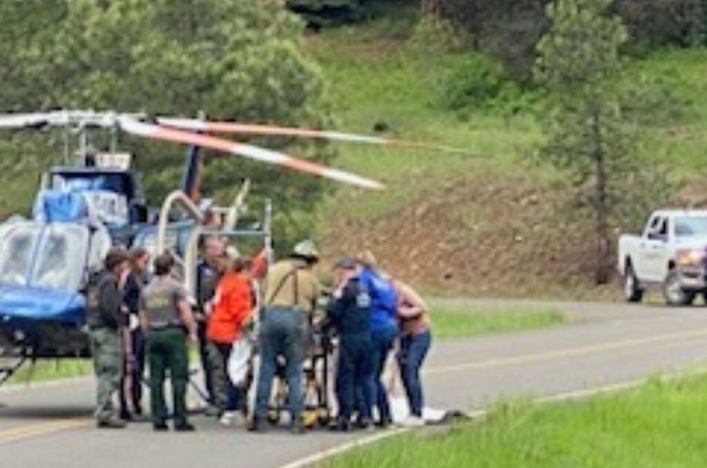 helicopter on the road and people