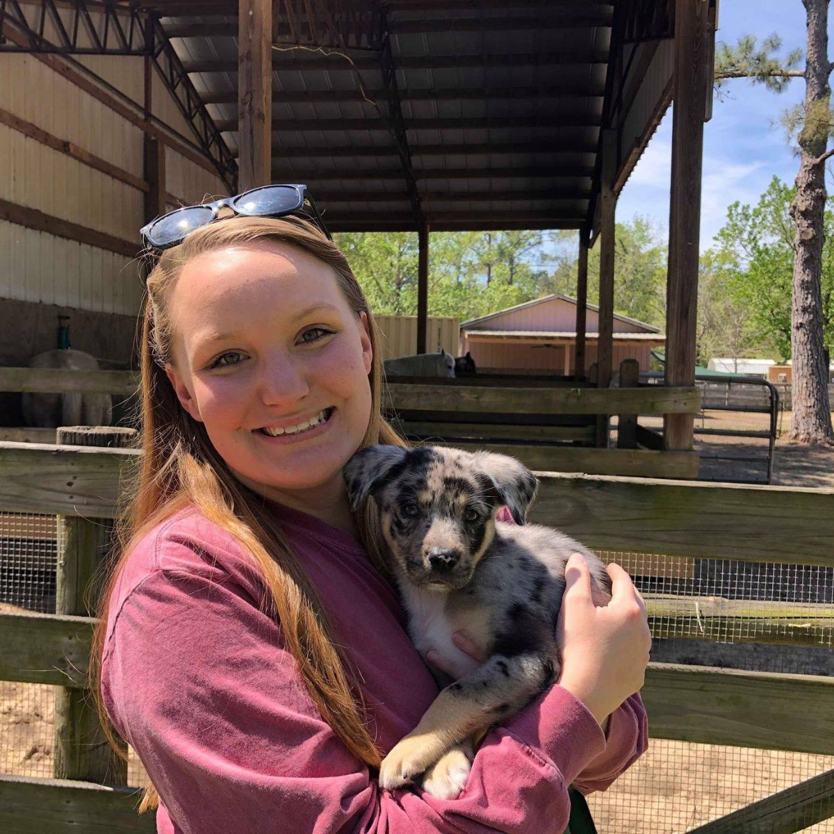 leopard puppy with woman