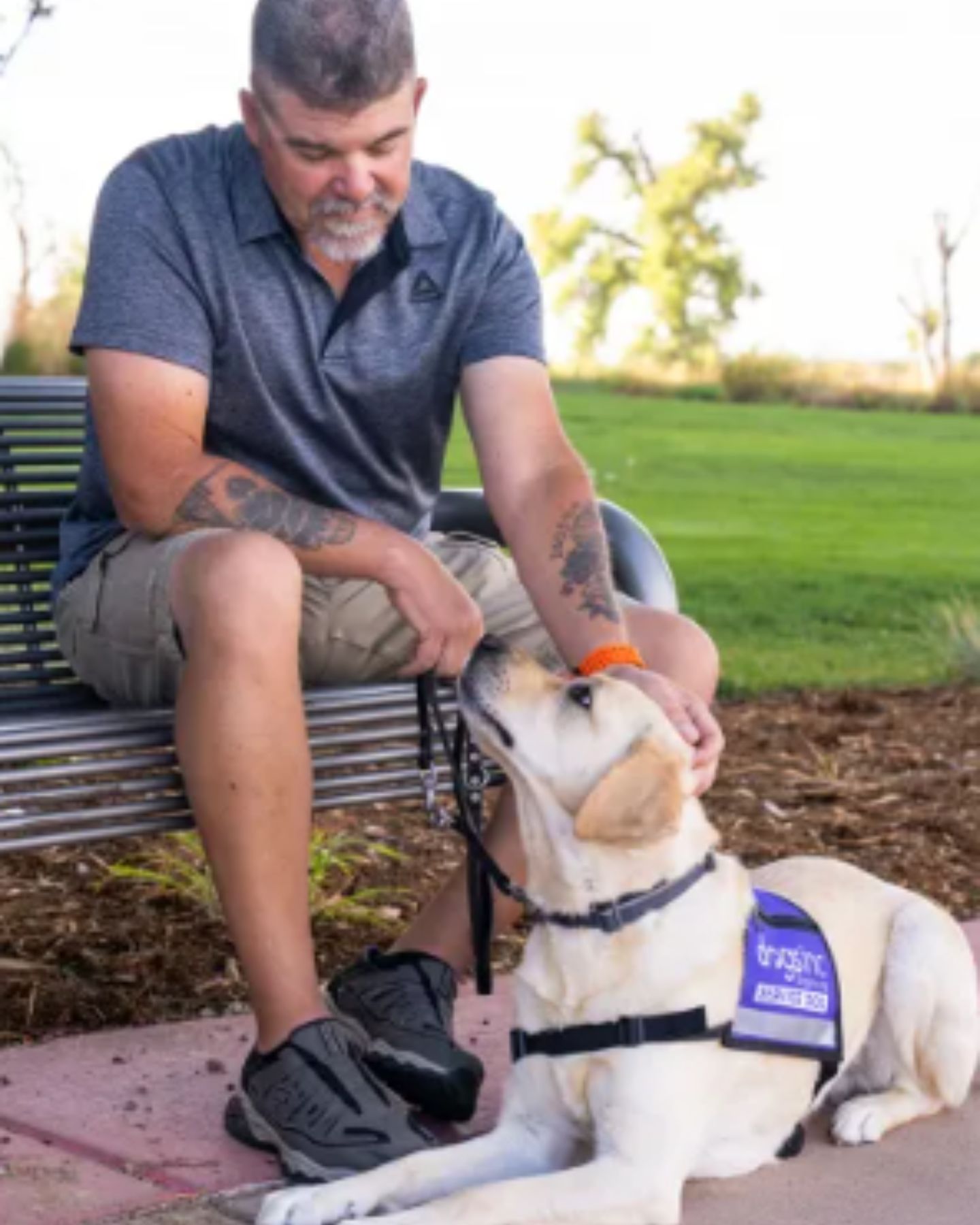 man and service dog