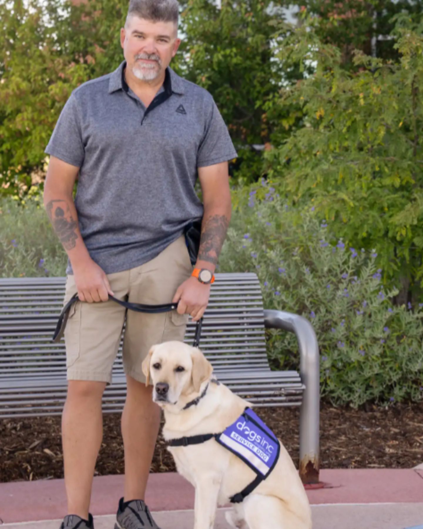 man with service dog