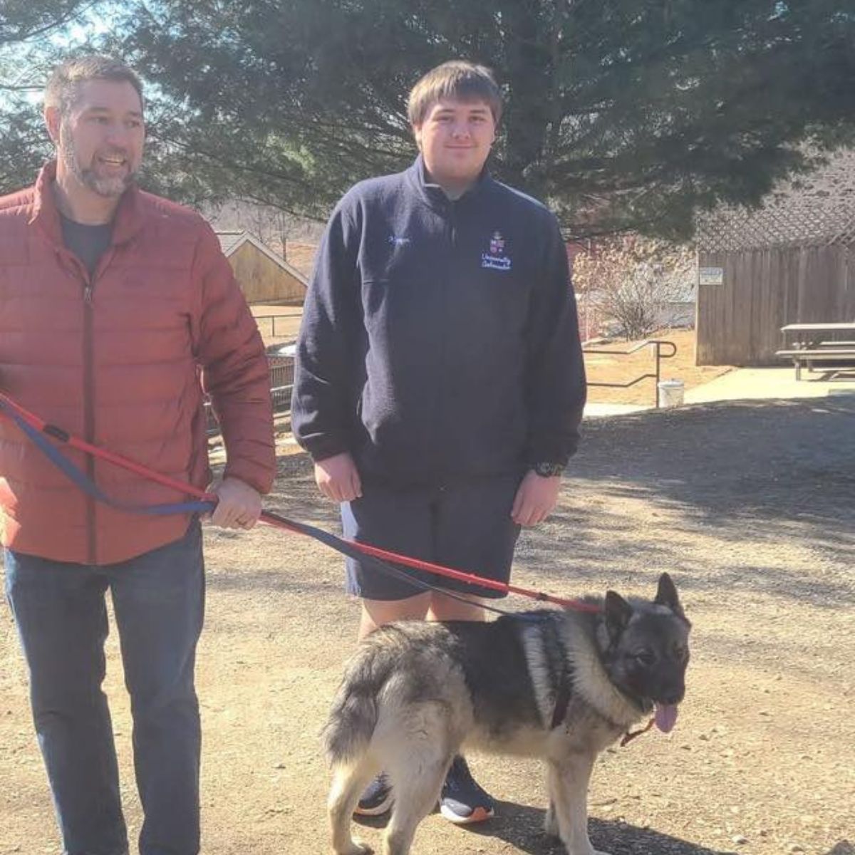 people with a shelter pup