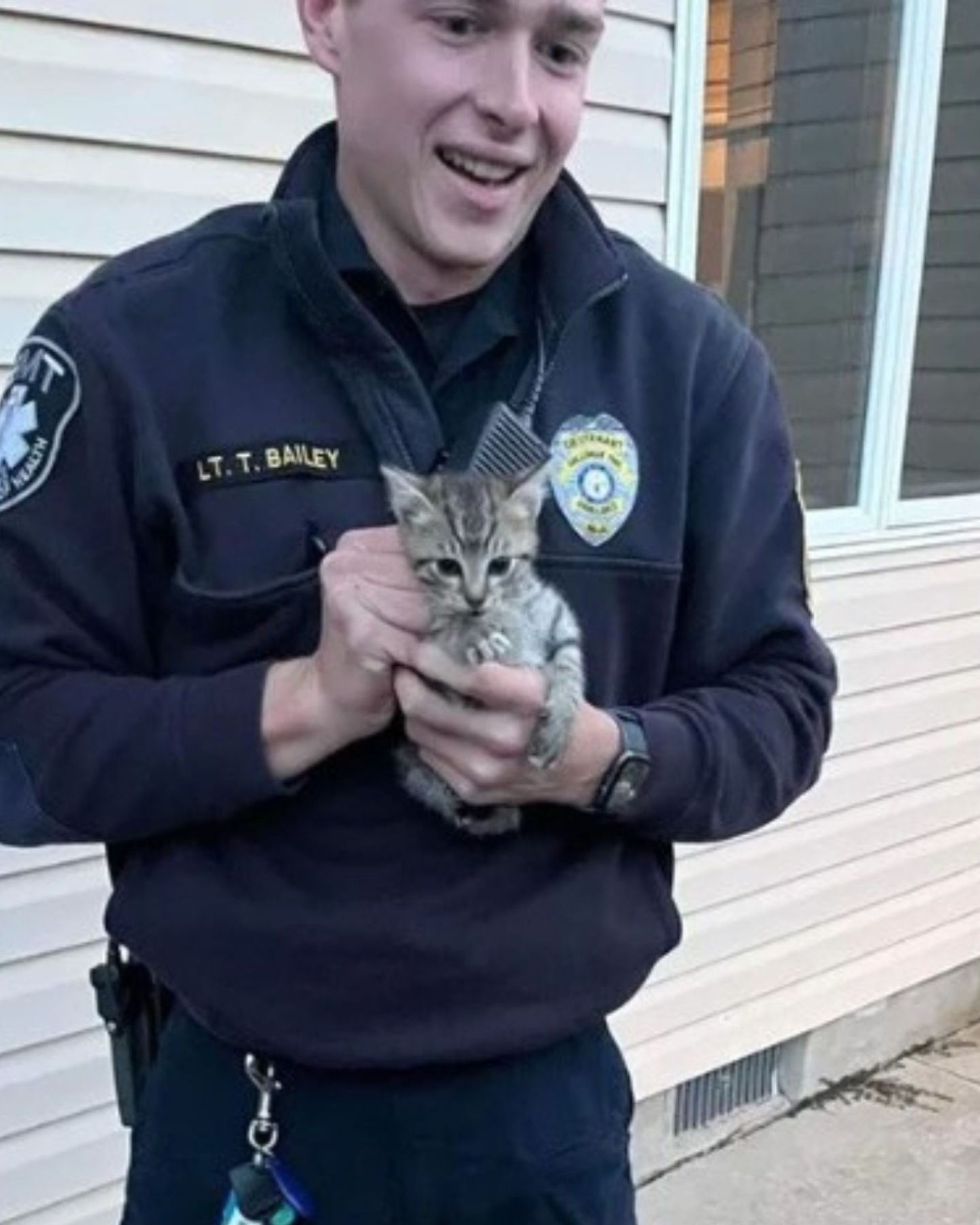 policeman with a kitten