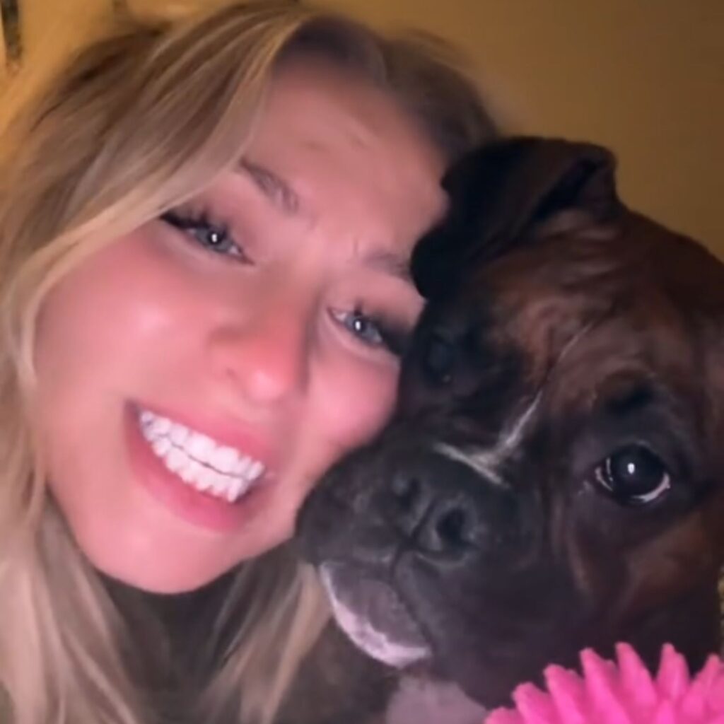 smiling woman with dog