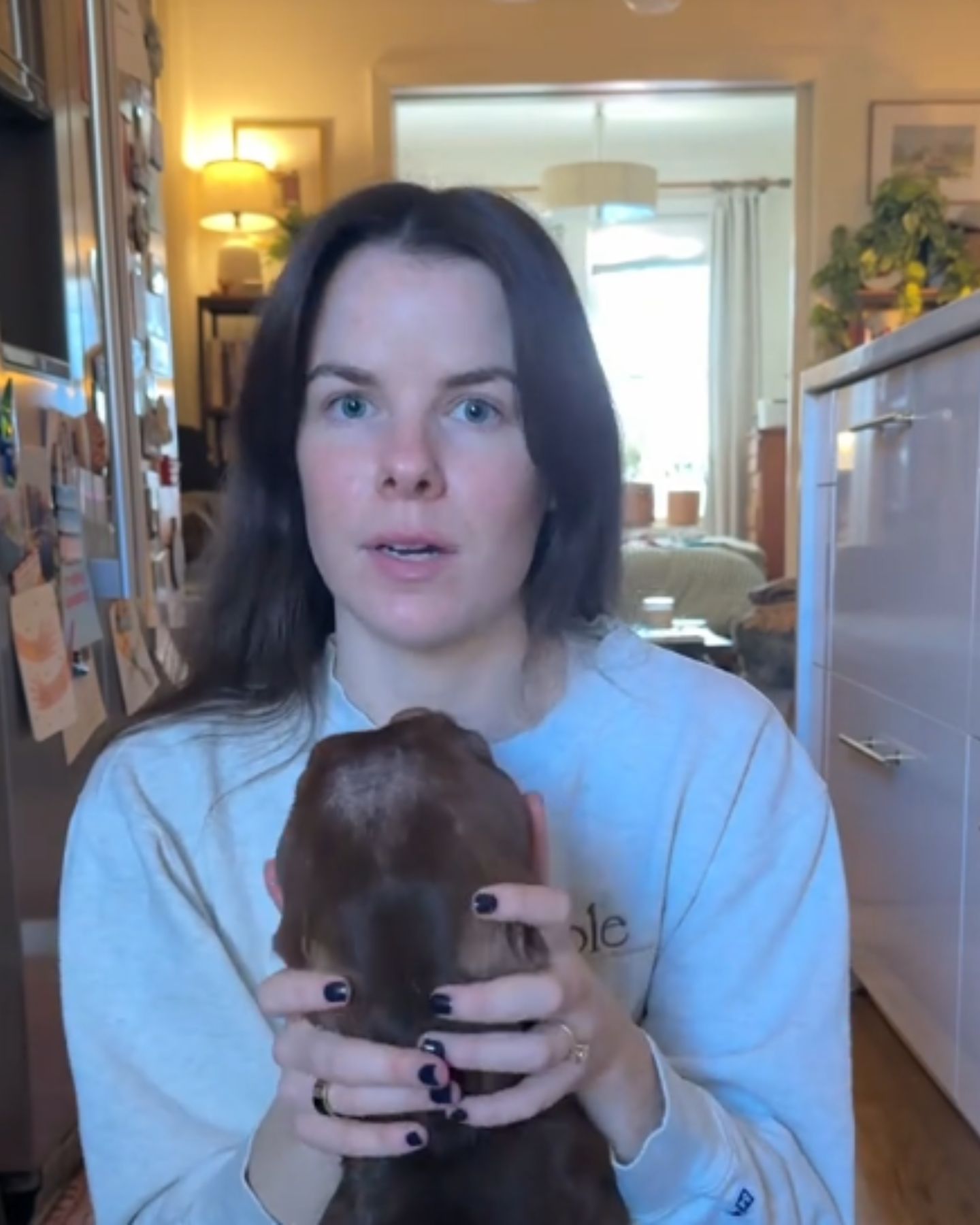 woman with skinny dog