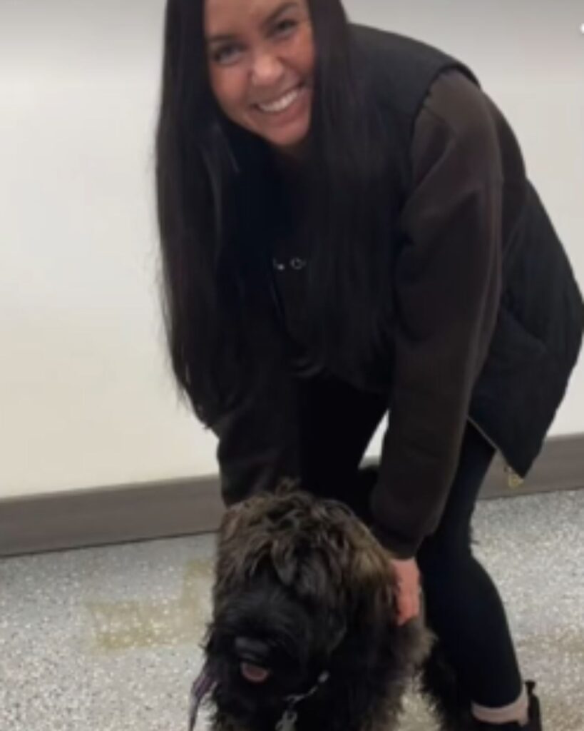 smiling woman with a dog