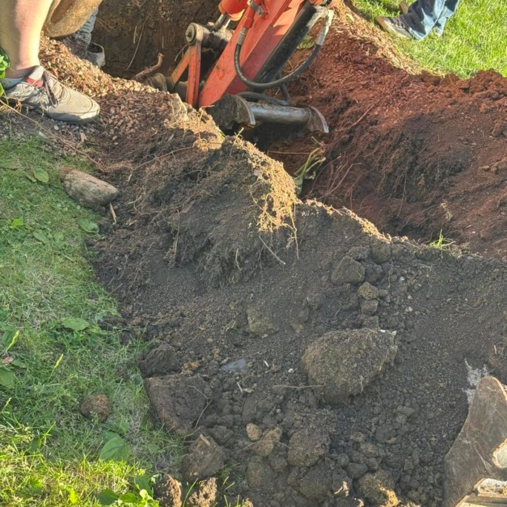 excavator digging a big hole