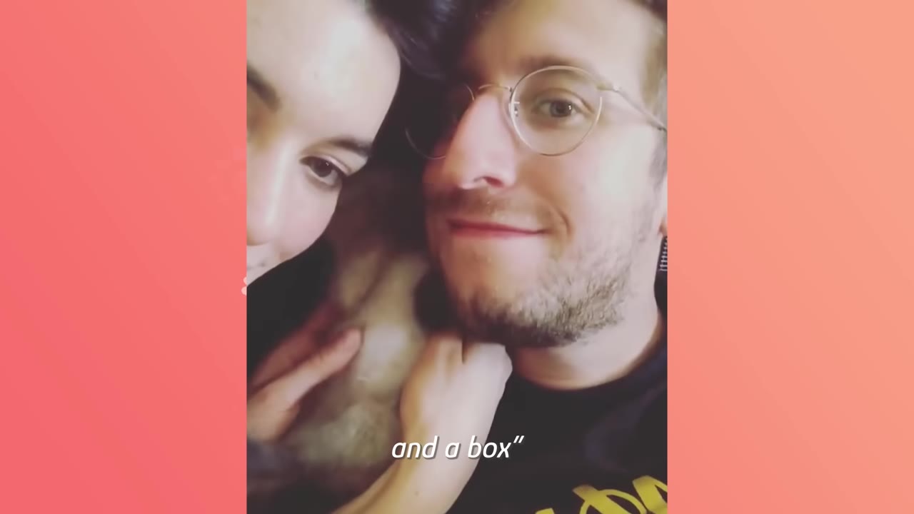 A close-up of a man with glasses and a woman smiling together, with the subtitle 'and a box' at the bottom.