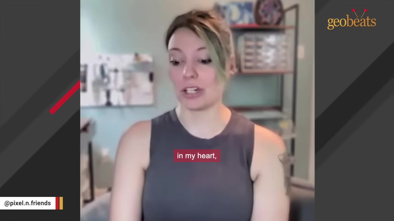 A woman with light brown hair and a grey tank top looks forward with a serious expression.