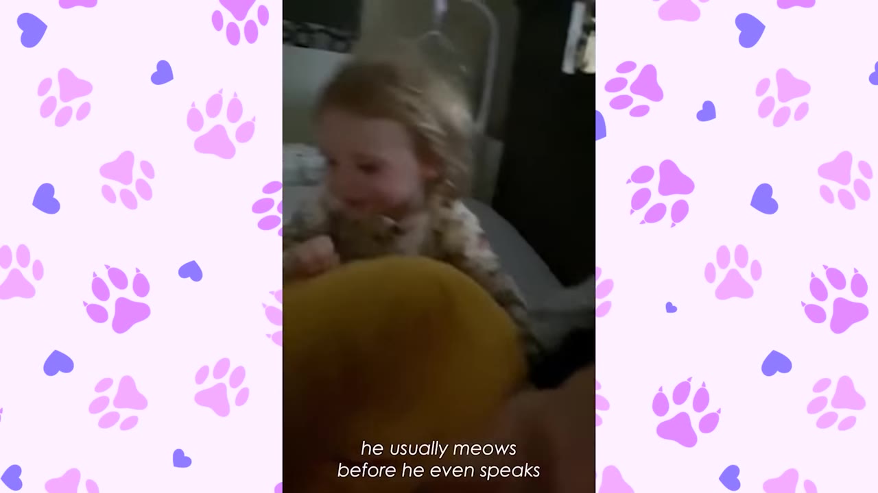 A young child waking up in bed with a subtitle that reads 'he usually meows before he even speaks'.
